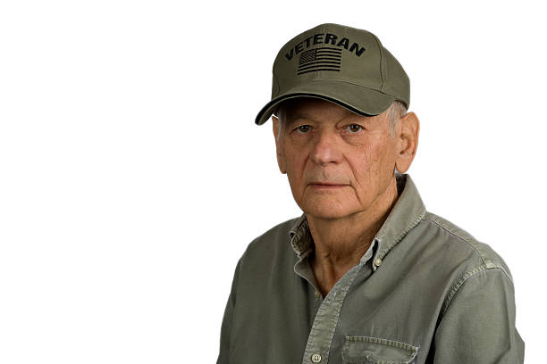 Senior American Veteran portrait on white background.
