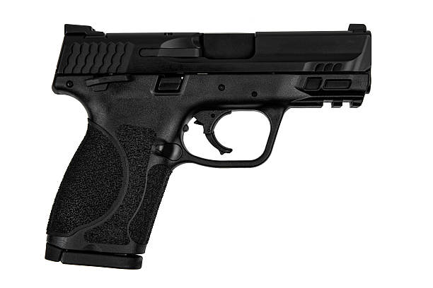 istock Black modern semi-automatic pistol isolated on a clean white background. 2252099959