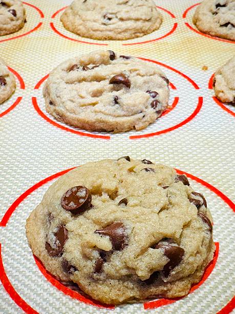 istock Chocolate chip cookies on silicone lined baking sheet 2252102902
