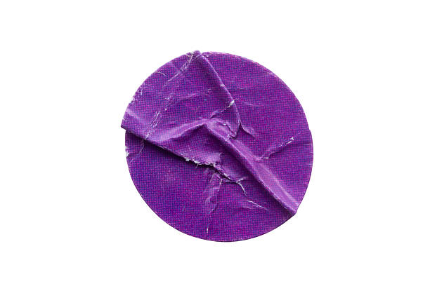 istock Blank purple round adhesive paper sticker label isolated on white background 2252103203