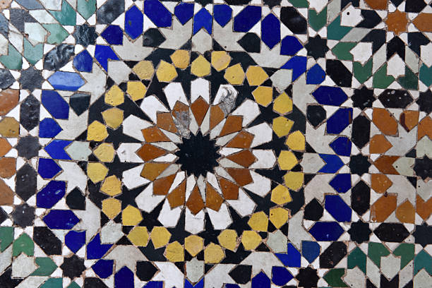 Red white, blue and green octagonal  flower motif floor decoration in Havana, Cuba.