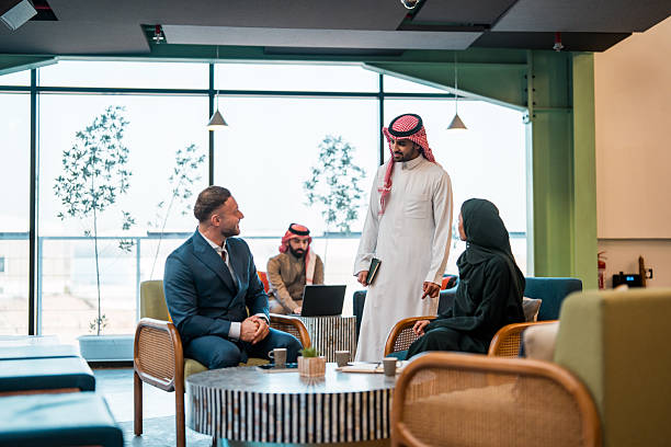 istock Professional Middle Eastern Business Meeting in Modern Office Setting with Diverse Team 2252104923