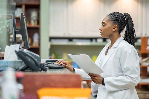 istock African American Scientist At Lab Computer Standing Beside Papers In Modern Laboratory 2252110668