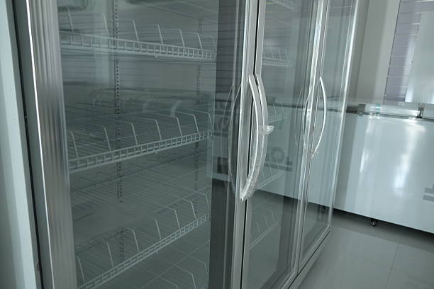 istock Empty commercial refrigerator with glass doors in a modern kitchen 2252125878