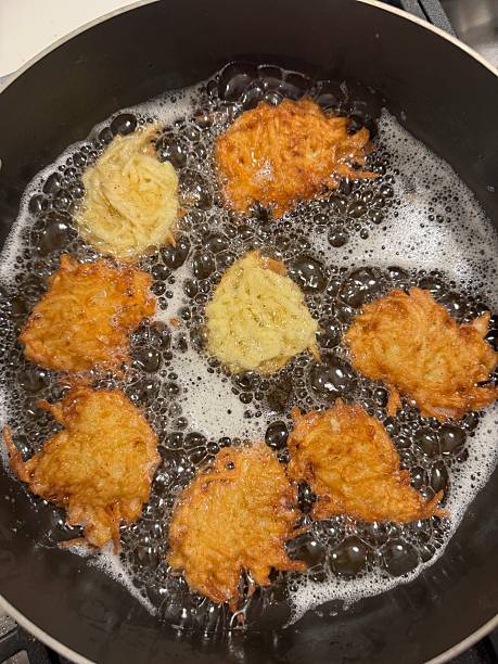 istock Cooking homemade potato latkes 2252127108
