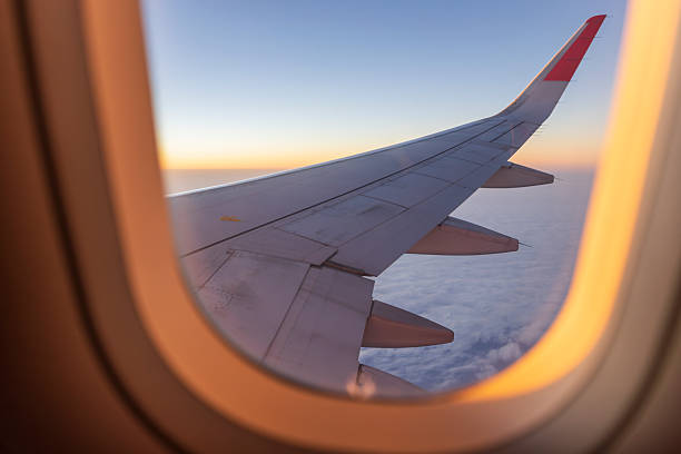 istock View from airplane window to see sky on evening time 2252127841