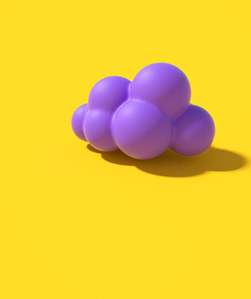 istock Purple cloud shape rests on bright yellow background, creating a playful and vibrant visual scene for creative design work 2252132102