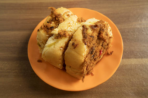 istock Fluffy Pork Floss Bread Rolls on Orange Plate 2252133248