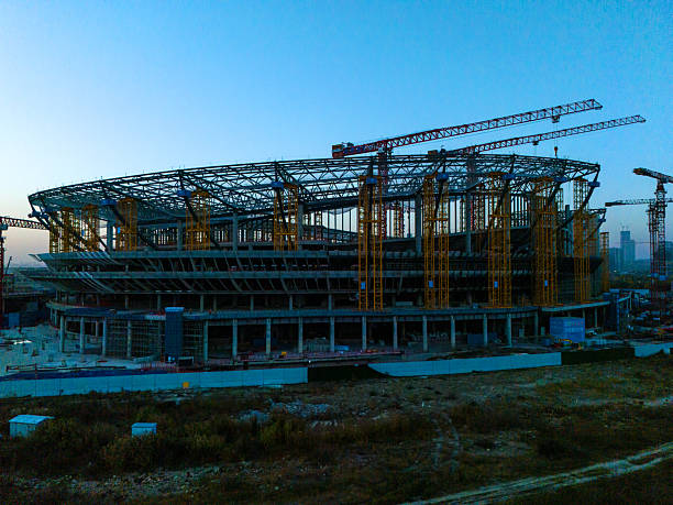 istock Construction site with tower cranes and unfinished buildings 2252133659