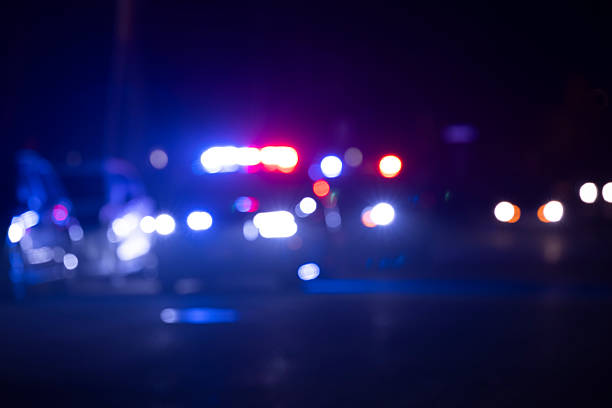 istock Police Abstract Car Lights Illuminated at Night 2252135512