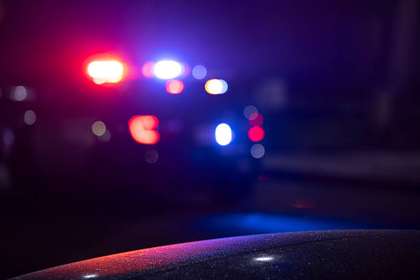 istock Police Abstract Car Lights Illuminated at Night 2252135526