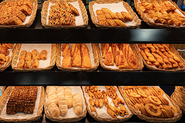 Assorted pastry bakery display fresh bread sweet roll croissant puff pastry baked goods golden crust pastry basket dessert pastry