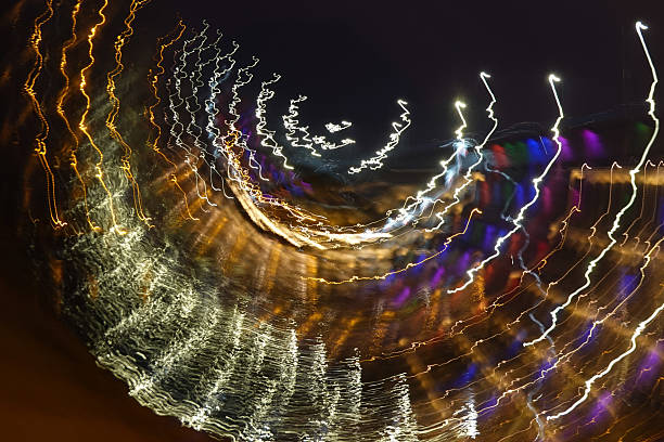 istock Abstraction with street lamps light over the river 2252139661