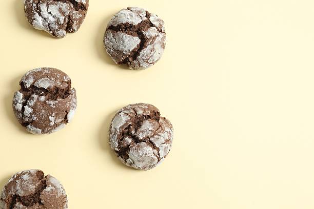 istock Delicious brownie cookies on color background 2252140253