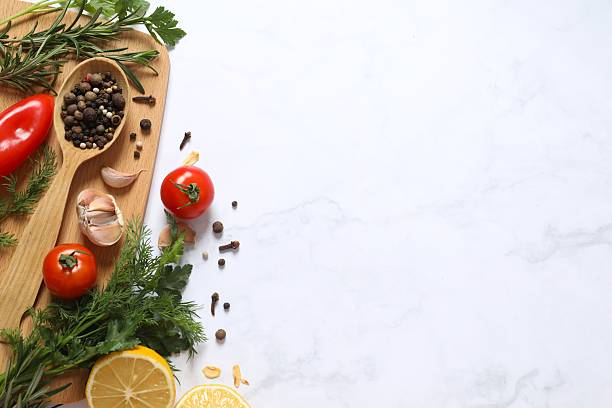 istock Fresh vegetables with herbs and spices, top view 2252140287