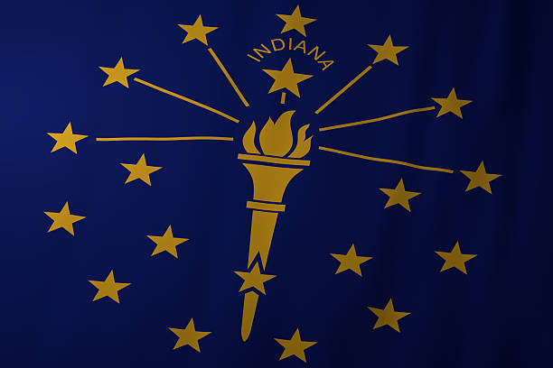 The official flag of Indiana featuring a golden torch surrounded by stars on a deep blue background. The torch represents liberty and enlightenment, while the stars symbolize Indiana’s place among the United States.