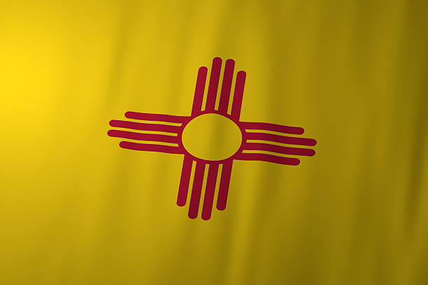 The official flag of New Mexico featuring a bright yellow field and a red Zia sun symbol at the center. The minimalist design reflects Native American heritage, unity, and the cultural identity of the state.