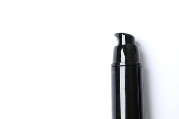 istock Black cosmetic bottle on white background 2252140594