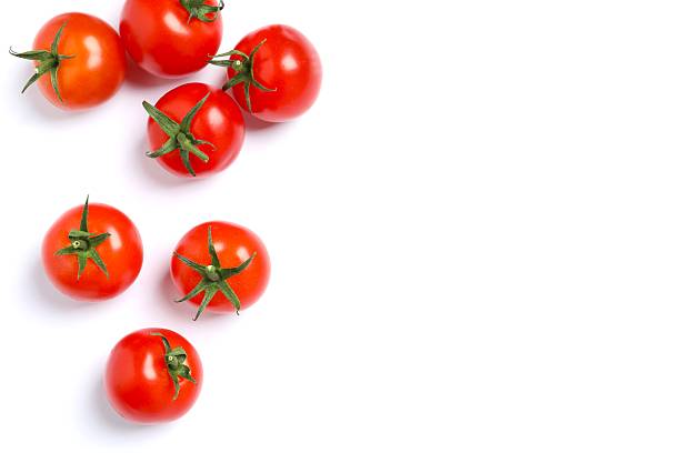 istock Fresh red tomatoes on white background, top view 2252141138