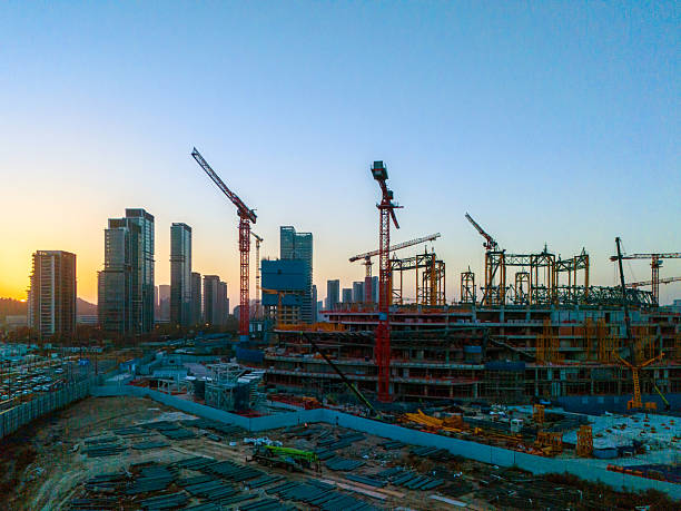 istock Construction site with tower cranes and unfinished buildings 2252146387