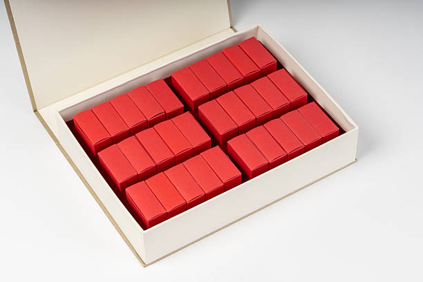 A red paper food packaging box with a white background