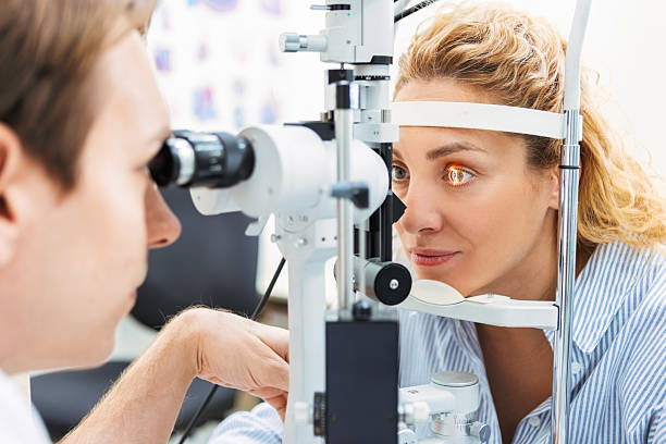 istock Woman Undergoing Vision Test at Eye Doctor 2252149899