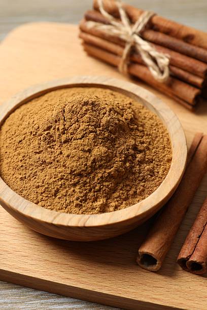 istock Aromatic cinnamon on a wooden background 2252151818