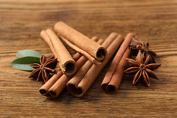 istock Aromatic cinnamon and anise stars on a wooden background 2252151820