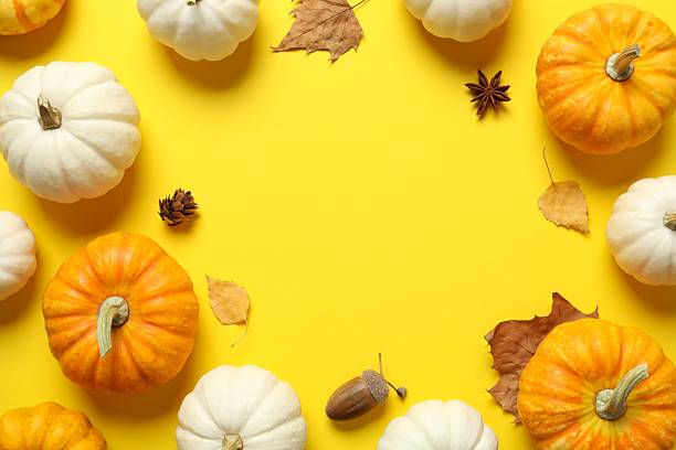 istock Beautiful autumn composition with pumpkins on a color background, top view 2252152074