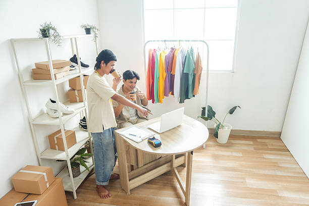 istock Two Entrepreneurs Collaborate on Laptop, Planning Online Store Inventory 2252153009