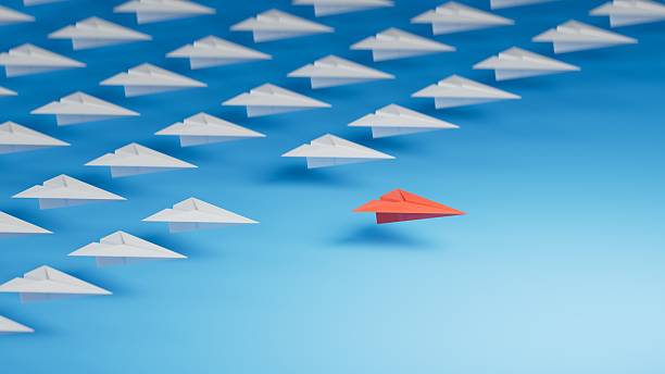 istock Different business concept.new ideas. paper art style. creative idea.Leaderplane concept. Red leader paper plane leading among white.3D rendering on blue background. 2252153287