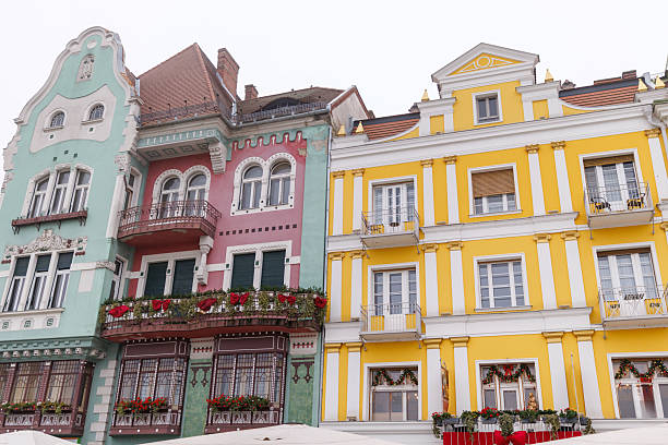 Color image depicting multi colored buildings and architecture in Timisoara old town in western Romania