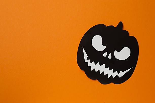 istock Halloween festive background design featuring black pumpkin. Top view, space for text 2252157134