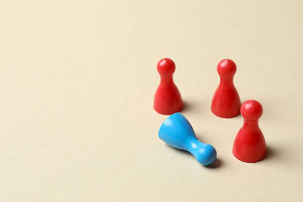 istock Group of pawns on the table. Concept of unity 2252158072