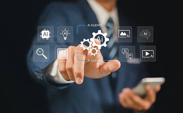istock Business interacts with a virtual interface displaying AI agents and futuristic technology icons, representing artificial intelligence innovation and digital transformation. 2252159462