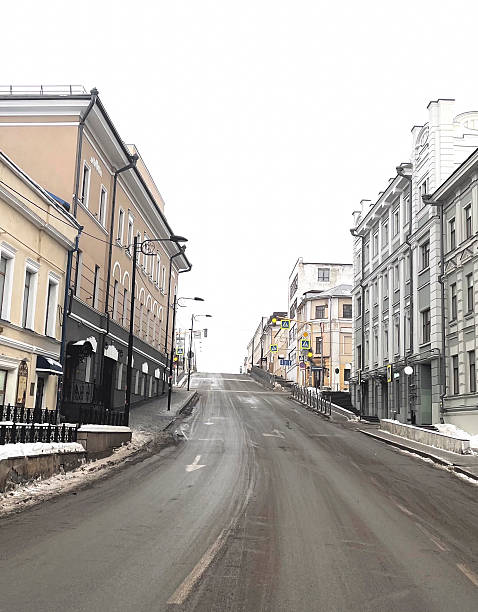 istock Snow blankets the empty street, highlighting the historic buildings on either side during winter 2252159625