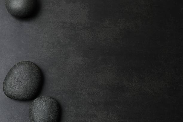 Spa concept. Composition with symbolic objects for spa salon. Stones representing balance. Close up, copy space, top view, background