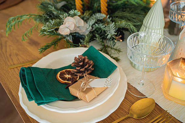 istock Festive table setting. Homemade Christmas with decor. Gift box, burning candles. New Year. 2252162955