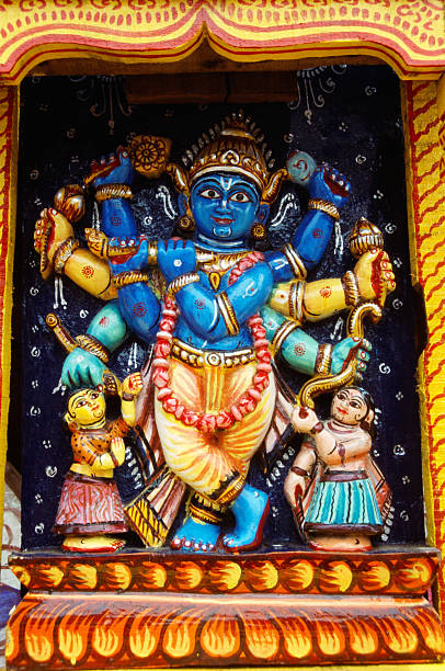 istock Lord Krishna playing flute wood relief sculpture 2252164063