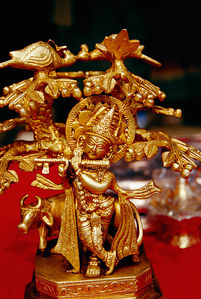 istock Lord Krishna playing the flute idol 2252164498