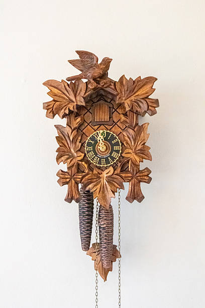 istock Authentic Black Forest cuckoo clock, HerrZeit by Adolf Herr, model The Traditional Vine Leaves, hand-carved in Germany, showcasing traditional craftsmanship 2252166254