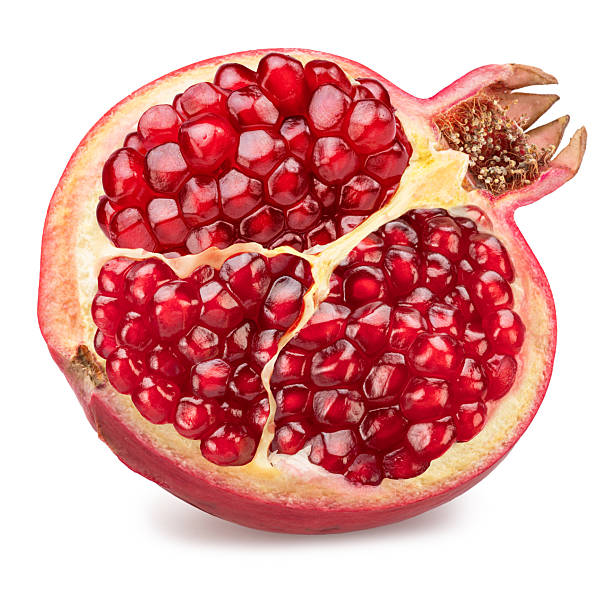 istock Pomegranate half with pomegranate seeds and isolated on a white background. Clipping path. Stacking focus, maximum detail. 2252166961