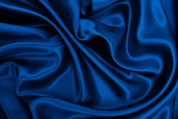 istock Smooth elegant blue silk or satin luxury cloth texture as abstract background. Luxurious Christmas background or New Year background design 2252167349