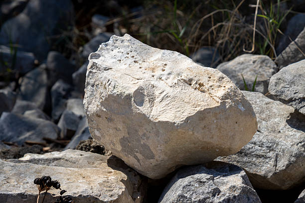 Three different types of rocks in sunlight, forming shadows. Kaolinite, Montmorillonite, clay minerals