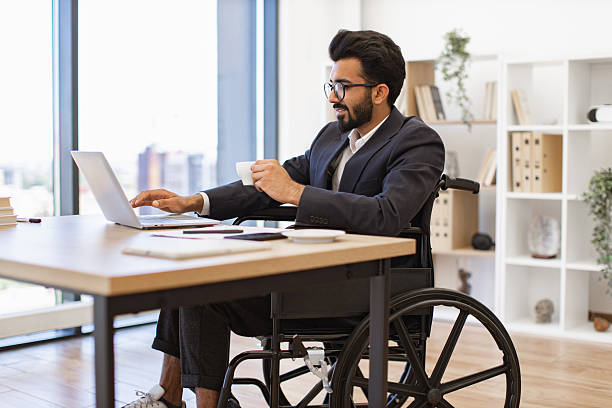 istock Businessman Working in Wheelchair 2252173064