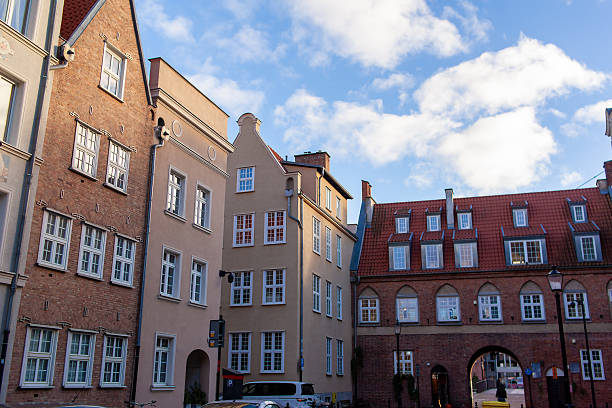 istock Old building with arches and windows in a city square during daylight 2252176251