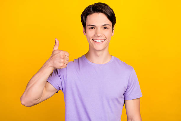 istock Portrait of attractive cheerful dreamy guy thinking copy empty space isolated over bright yellow color background 2252177083