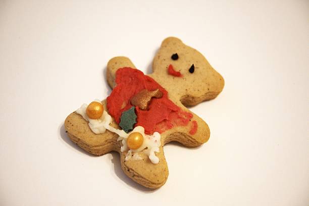 istock Decorated Teddy Bear Shaped Gingerbread Cookie on White Background with Copy Space 2252177118