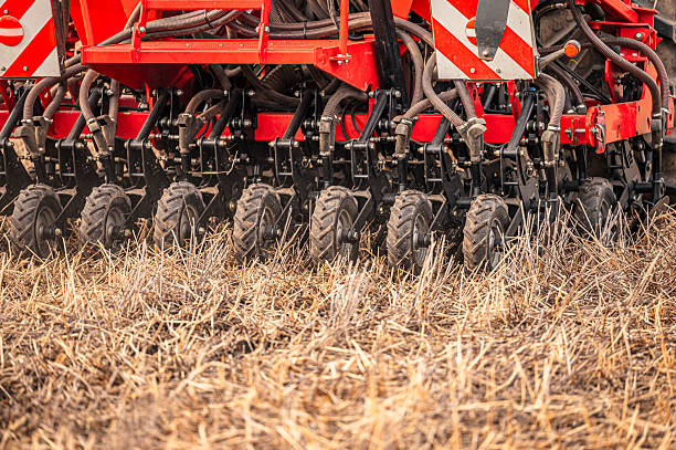 istock Direct seeding machine or seed drill machine for depositing seeds directly into the soil to protect the soil 2252179804