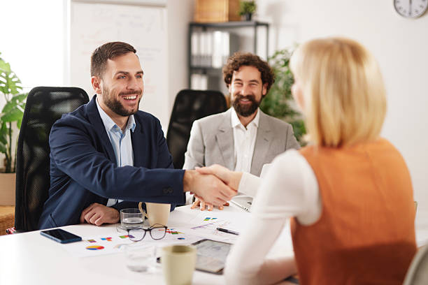 istock Business team engages in teamwork and brainstorming session in an office setting during the day to achieve success and build strong connections among members 2252179834